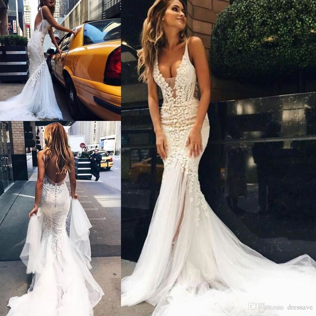Stephane Rolland bride depicts contemporary and elegance in white  asymmetrical style that will flow every curve and show off radiant skin  seen underneath