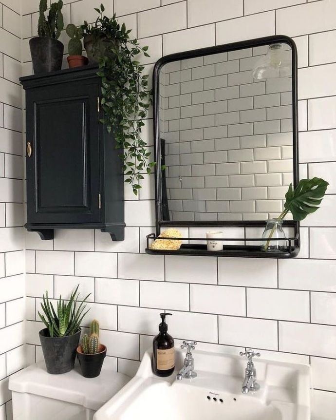 Bathroom vanity and unframed mirror