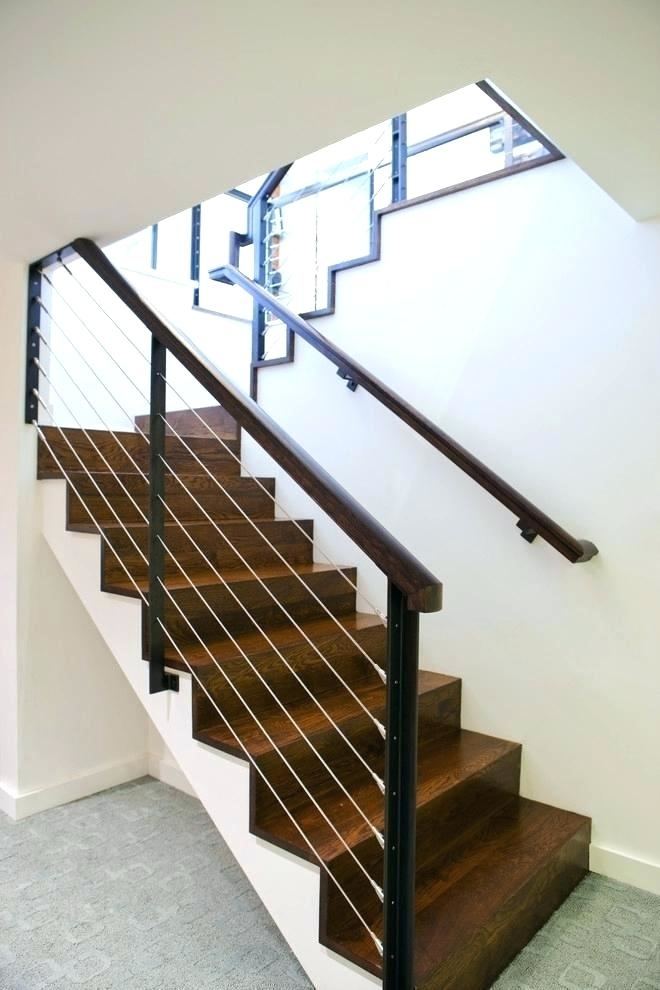 The New Craftsman contemporary staircase and planked wall
