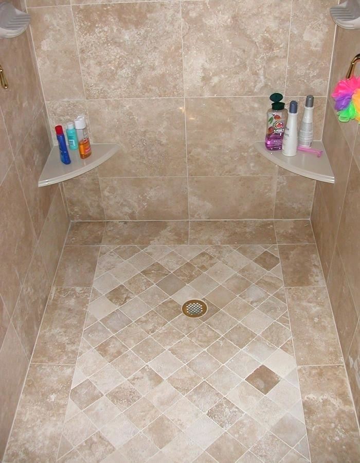 The shower is enclosed in travertine and topped with a skylight