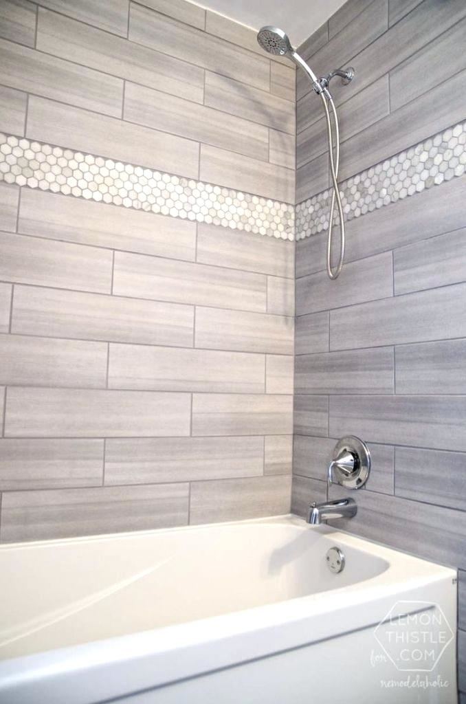 Shower with shower glass and bench in guest bathroom