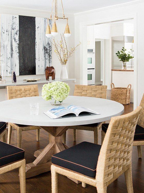 In the dining room 1950s Jacques Adnet chairs join a 19thcentury English table