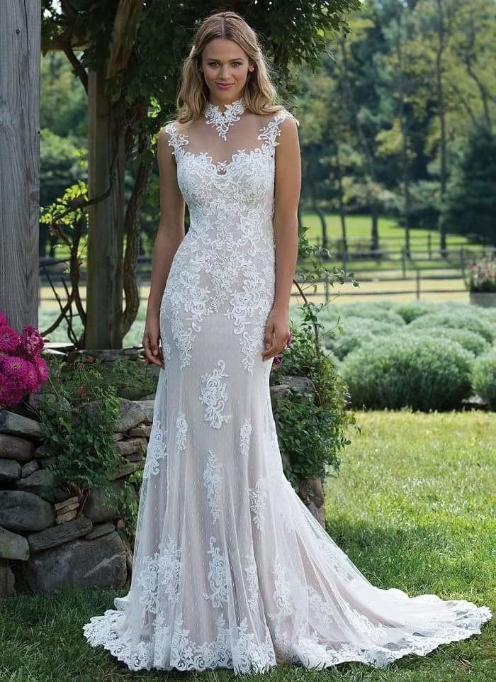 Simply Val Stefani IVY features a trumpet silhouette and stunning laced chapel train that will have guests admiring you as you walk down the aisle