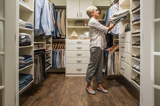 There could even be on single door on the end, closing both wardrobes off from the central 'corridor'