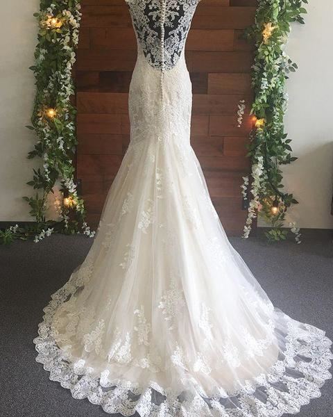 Spring 2017 Bohemian Mermaid Wedding Dresses Jewel Neck Fit And Flare Court Train Long Sleeves White Summer Beach Bridal Gowns Lace Wedding Gown Mermaid