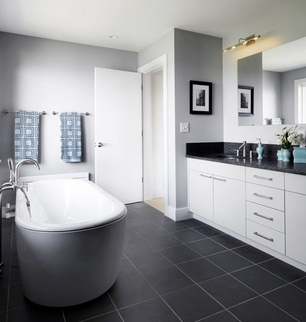 The brown wood flooring design captures this pure white bathroom scheme