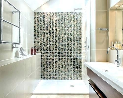 bathtub and latrine connected by stainless steel shower on travertine tile  wall in 21