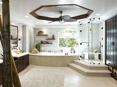 The stylish master bath is a mix of beautifully patterned porcelain tiles  and wood