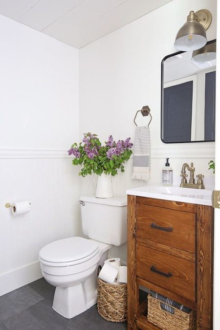 Bathroom ideas/ love how they have the  tiles that looks like the runner carpet