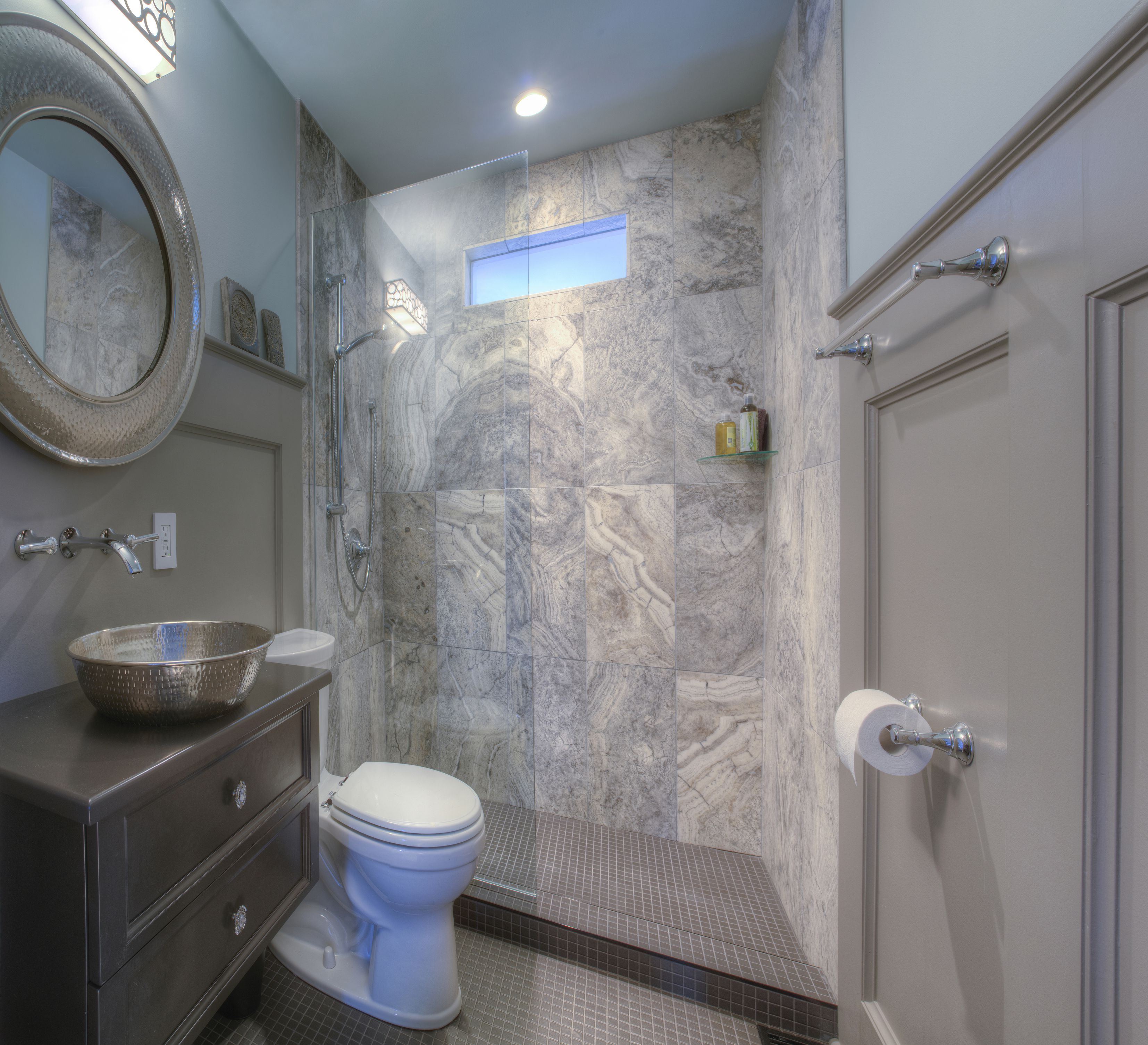 Small beach style bathroom in blue with a hint of gray [Design: PVA  Developments