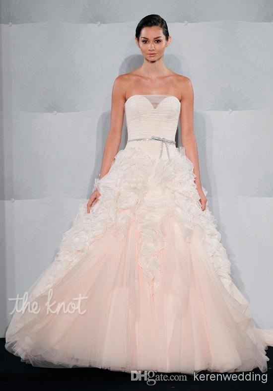 Knowing that some brides would love the idea of having their own Mark Zunino  gown, but love the idea and sentiment of wearing their mother's wedding  dress,