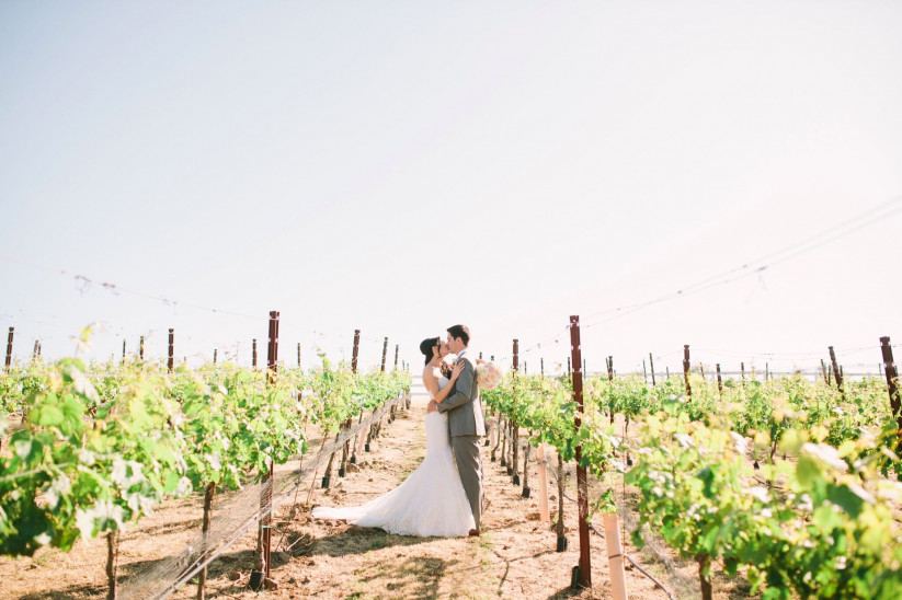 Temecula outdoor wedding at falkner winery bride mermaid style gown with  lace bodice and sweetheart neckline
