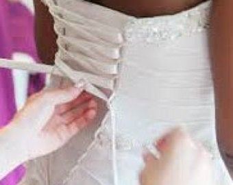 Here you can see one of the bigger wedding dress alteration we have done