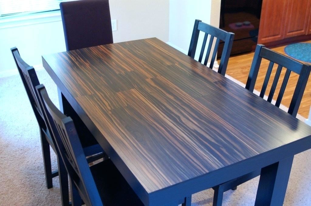How I refinished a wood veneer table top to make it look like solid wood  using stain over paint